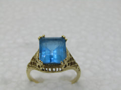 14kt Swiss Blue Topaz Ring, 5.25 TCW, Sz. 7.5, 4.22.gr. Vintage Themed Design