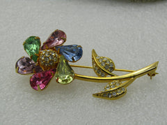 Vintage Joan Rivers Rhinestone Spinning Floral Brooch, Pinwheel, Pastels, gold tone. 2.5"
