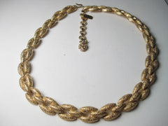 Vintage Gold Tone Woven Link Textured Monet Choker Necklace that is 13" long with a 2.5" extender, 1970-80's